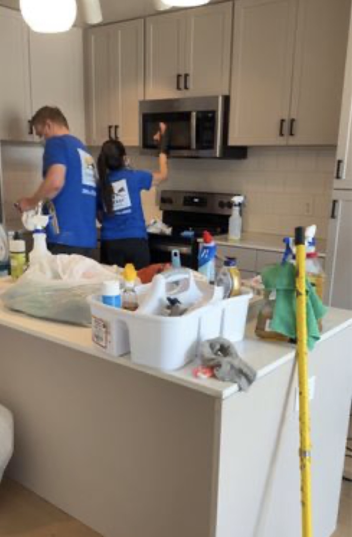 Sun Ray Cleaning team member cleaning inside a home