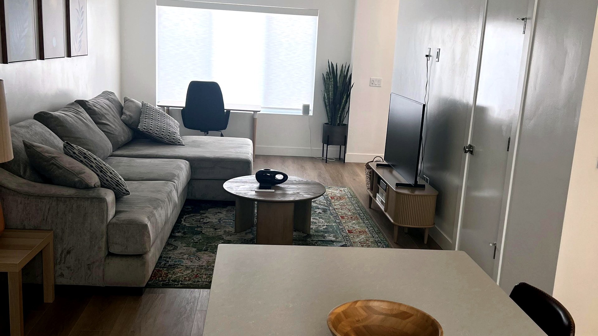 Open-concept Park City vacation rental living room ready for Airbnb guests